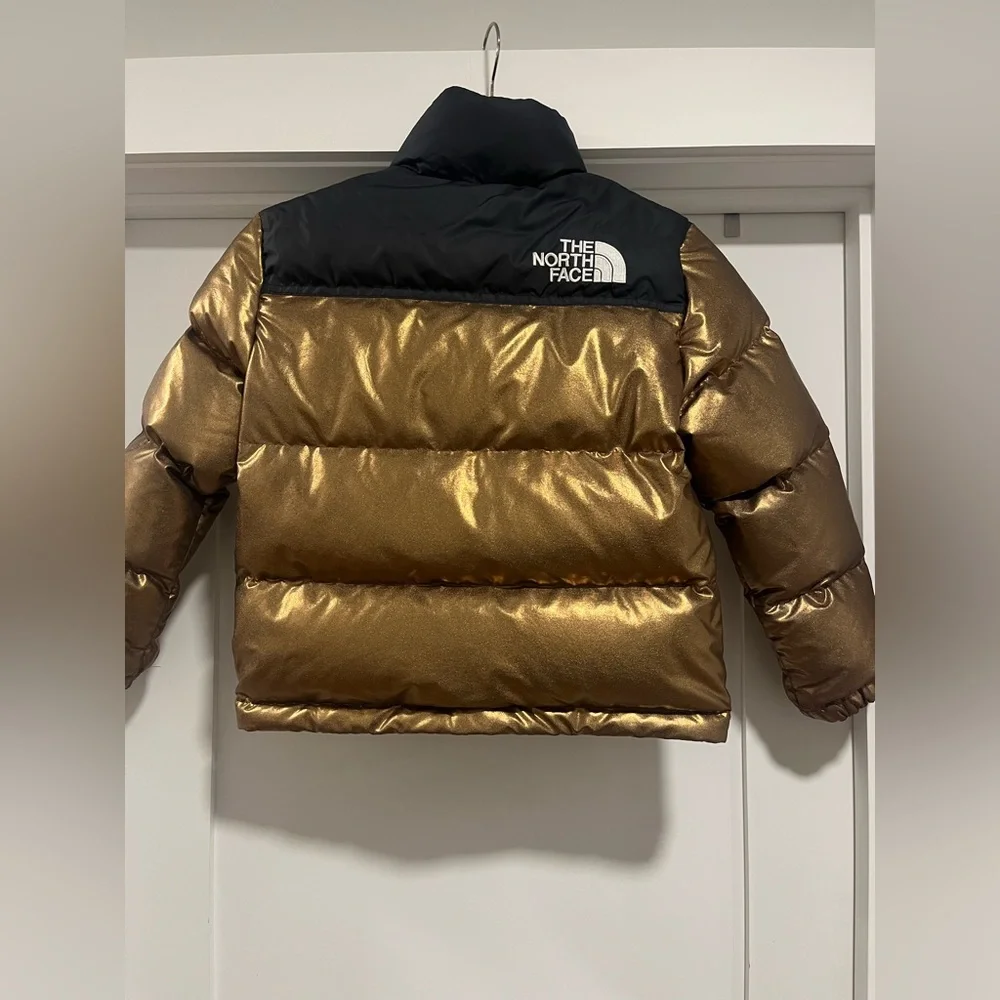 The North Face Kids' 1996 Retro Nuptse Jacket in metallic copper. Size: Kids 7/8 - Picture 3 of 6
